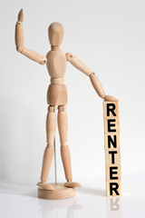 The wooden man raised his hand, and under his left hand he has cubes with the inscription - RENTER