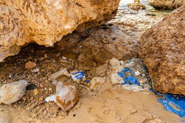 Rubbish on the beach. Ecological problem. Beach pollution
