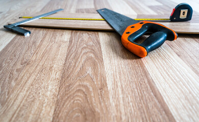 Construction Tools Lying on Wooden Floor Boards for Work
