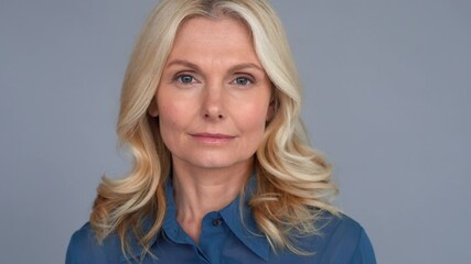 Confident smart 50s middle aged blond woman looking at camera. Mature older lady professional leader, businesswoman manager, sales representative or business coach close up face front portrait. - Powered by Adobe