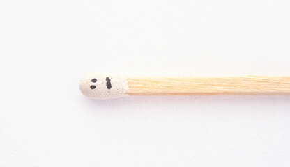 matchstick with faces painted on the heads