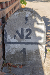 Chaves, Portugal, September 6, 2020: The KM1 road marker of the Nacional Road 2, the longest road in Europe. Portugal longest road, the N2, (or Nacional 2), runs from Chaves to Faro.