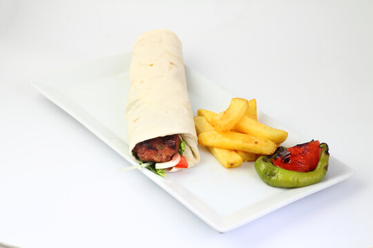 Turkish Shawarma durum Traditional sish kebab wrap and kofte meatball