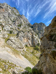 The Cares Route in the heart of Picos de Europa National Park, Cain-Poncebos, Asturias, Spain. Narrow and impressive canyon between cliffs, bridges, caves, footpaths and rocky mountains.
