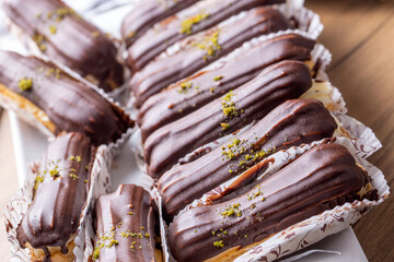 Traditional french eclairs with chocolate.