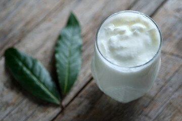 Obraz na płótnie Canvas Natural yogurt in a glass cup