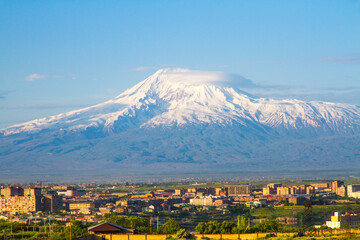 Mount Ararat (Turkey) at 5,137 m viewed from Yerevan, Armenia. This snow-capped dormant compound volcano consists of two major volcanic cones described in the Bible as the resting place of Noah's Ark.