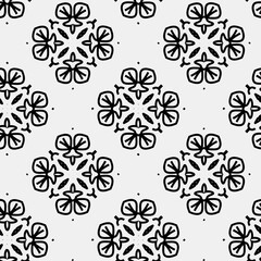 

Raster geometric ornament. Black and white seamless pattern with star shapes, squares, diamonds, grid, floral silhouettes. Simple monochrome ornamental background. Repeat design for decor, print