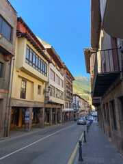 Potes, Spain - September 2, 2020: Views of the medieval village of Potes with its colorful houses and many restaurants with terraces.
