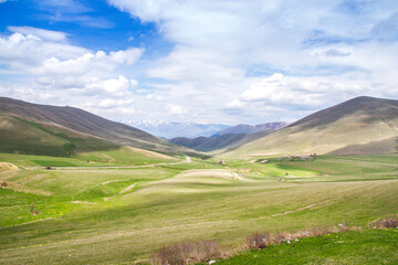 Fototapeta premium Beautiful green grassland hills countryside in Armenia.