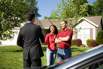 Home: Couple Meets with Real Estate Agent