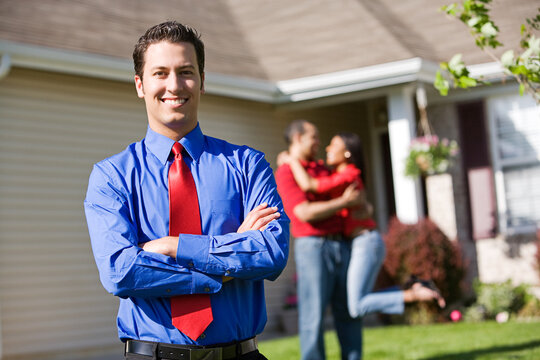 Home: Agent with Excited Couple in Background