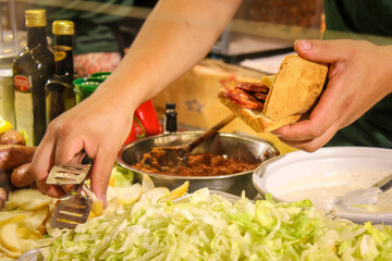 Making a panino, Italian street food bread roll