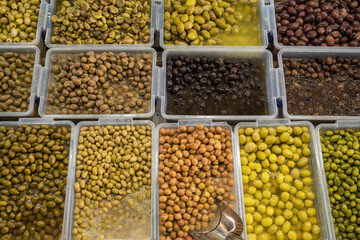 Different types of olives at street market