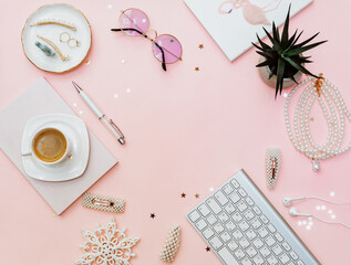 Creative Feminine workspace with notebook, cup of coffee, and accessories, blogger concept. Flat lay, top view..