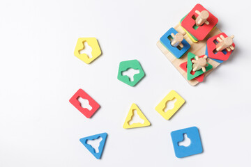 Children's logic game, puzzle,pyramid. Colorful bright wooden details, sorter. layout On a white background with space