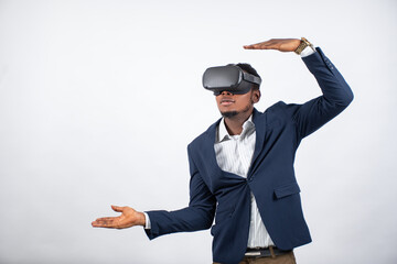 young businessman conversant with technology using a virtual reality headset