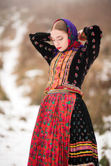 Young beautiful slovak woman in traditional dress. Slovak folklore