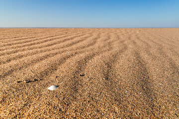 Beautiful empty sand wave beach or desert texture.