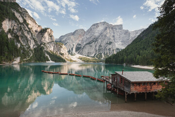 Fototapeta premium Discovering Dolomites mountains in Northern Italy - Lago di Braies (Pragser Wildsee) in Tirol