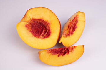 half a peach and a few slices are fleshy up
