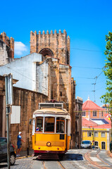 Obraz na płótnie Canvas Famous vintage tram in the street of Alfama, Lisbon, Portugal