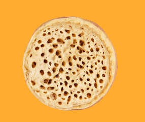 Crumpet isolated on the yellow