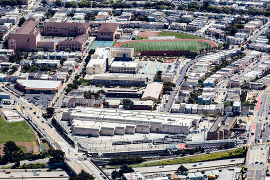 Aerial View of a Local High School and an Athletic Field in a Neighborhood in South San Francisco, California, USA