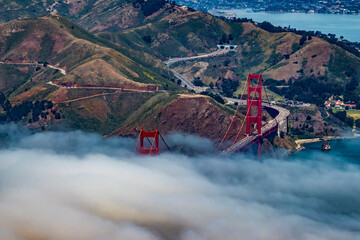 Clouds and Fog Float over the Iconic Golden Gate Bridge as It Crosses over to Sausalito in San Francisco, California, USA 