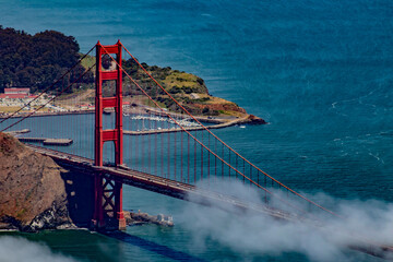 Aerial View of a Small Puffy Cloud over the Beautiful Golden Gate Bridge in San Francisco, California, USA
