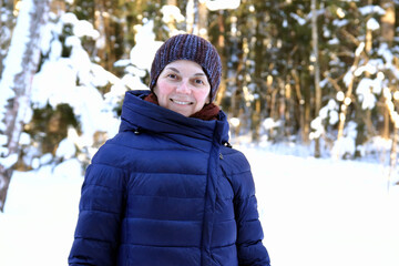 portrait of a woman in the winter forest 