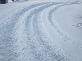 Car curved track in snow. Fast ride 