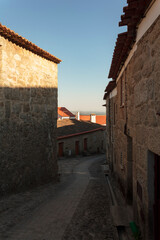 Narrow street on portuguese historic village Castelo Novo