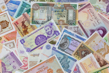 Background from banknotes from different countries of the world and different times, cashless