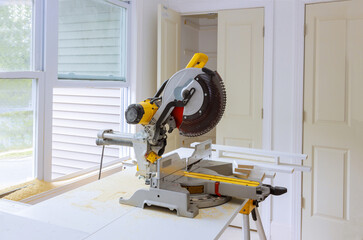 Close up of Circular saw cutting sharp rotary blade on woodwork
