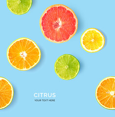 Creative pattern made of lemon, lime, orange and grapefruit. Flat lay. Food concept. Lemon, lime,...