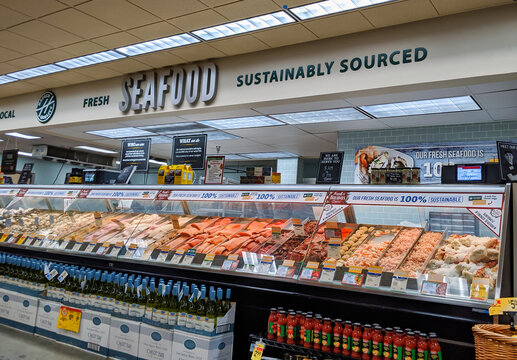 Woodinville, WA / USA - circa December 2019: Fresh seafood, sustainably sourced, stocked in the deli and meat section of a Haggen grocery store.