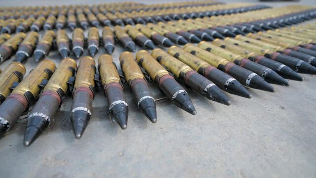 Tape of large-caliber aviation cartridges.