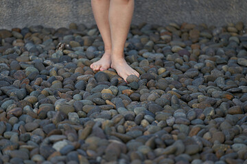 feet walk on round stone way