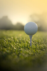 White Golf Ball on a White Tee Shot Against the Sun