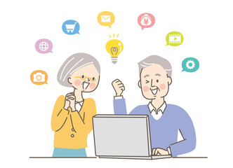 パソコンを操作するシニア男性と女性