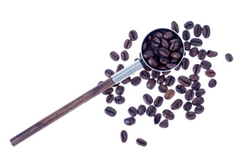 Coffee beans and vintage spoon on white background. Studio Photo