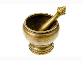 Antique copper mortar with pestle isolated on white background.