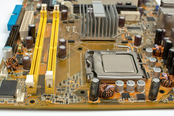 printed motherboard with electronic components close up