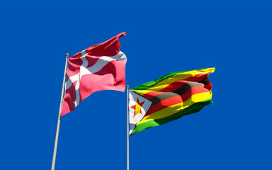 Flags of Zimbabwe and Denmark.