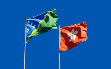 Flags of Solomon Islands and Hong Kong HK.