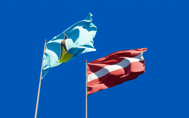 Flags of Saint Lucia and Latvia.