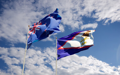 Flags of New Zealand and American Samoa.