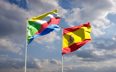 Flags of Spain and Comoros.