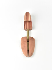 Wooden shoe lasts on a white background.